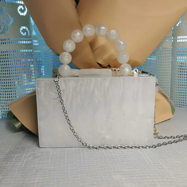 Elegant Pearlescent Clutch Bags for Gala Evenings